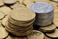 Two stacks of coins of yellow and white metal Royalty Free Stock Photo