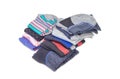 Two stacks of folded different men`s and women`s socks Royalty Free Stock Photo