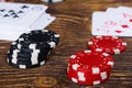 Two stacks of poker chips on a wooden table Royalty Free Stock Photo