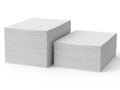 Two stacks of pristine white paper sheets Royalty Free Stock Photo