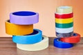 Two stacks colorful rolls of duct tape.