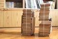 Two stacks of used books tied with packthread