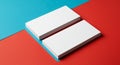 Two stacks of white rectangular cards are placed on intersecting red and blue