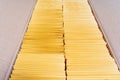 Two Stacks of Yellow Mailing Envelopes in a Shipping Box Royalty Free Stock Photo