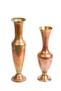 Two stamped brass vases isolated Royalty Free Stock Photo