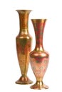 Two stamped brass vases isolated Royalty Free Stock Photo