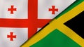 The flags of Georgia and Jamaica. News, reportage, business background. 3d illustration