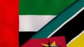 The flags of United Arab Emirates and Mozambique. News, reportage, business background. 3d illustration