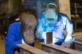 Two steel construction workers welding metal Royalty Free Stock Photo