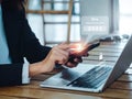 Two steps authentication 2FA concept. 2023, Verification code and key icon alert on smart phone while using computer.