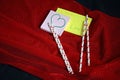 Two sticky notes and hearts on straw. Royalty Free Stock Photo