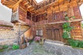 Two-storey house made of pure wood in the Balkan village of Zheravna in Bulgaria Royalty Free Stock Photo