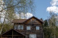 Two-storey wooden country cottage. Summer rest. Comfortable cottage for a family vacation