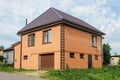 Two-storeyed orange brick house