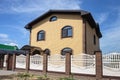 Two-storeyed yellow brick cottage