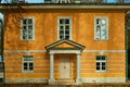 A two storied orange outhouse with white stucco moldings in Museum-Estate Arkhangelskoye