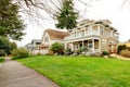 Two story american house with white column porch