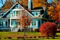 Two Story Blue House in the Fall Royalty Free Stock Photo