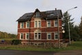 Two-storey brick house with solar panels on the roof Royalty Free Stock Photo