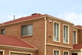 Two-Story Brick House Under Blue Spring Skies Royalty Free Stock Photo