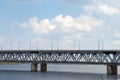 A two-story bridge over the Dnieper river, railway and automobile in Ukraine to the cities of the Dnieper on the background of the Royalty Free Stock Photo