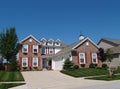 Two Story Home With Flowerboxes and Weather Vane Royalty Free Stock Photo