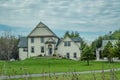 Two Story House on Grassy Hill