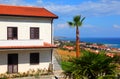 Two-story house with brown roof and stairs Royalty Free Stock Photo