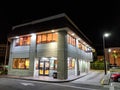 Two story McDonalds Store at night with Drive Thru and entrance Royalty Free Stock Photo