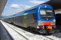 Two-story passenger train at the platform of the railway station. Florence, Italy Royalty Free Stock Photo