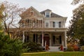 A two story wooden colonial era historic house in a well maintained garden in the historic district of Rockville Royalty Free Stock Photo