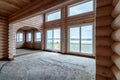 A two-story wooden cottage from the inside out in coniferous spruce pine green forest. Amazing heartbreaking view from the Royalty Free Stock Photo