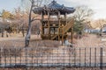 Two story wooden gazebo with tiled roof