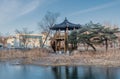 Two story wooden gazebo with tiled roof