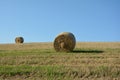 Two Straw bales on harvested field Royalty Free Stock Photo