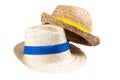 straw hat blue and yellow ribbon isolated on isolated white background Royalty Free Stock Photo