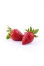 Two strawberries on a white background, isolate Royalty Free Stock Photo