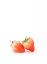 Two strawberry on white