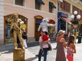 Two street actors in the image of living statues on the street Massena in the city Nice, France.