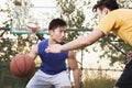 Two street basketball players on the basketball court Royalty Free Stock Photo