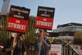 Two striking Writers Guild of America members outside CBS Television City