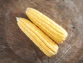 Two stripped tender corn cobs Royalty Free Stock Photo