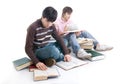 The two students with the books isolated Royalty Free Stock Photo