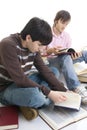 The two students with the books isolated Royalty Free Stock Photo