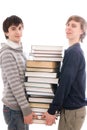 Two students with books isolated on a white Royalty Free Stock Photo