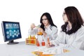 Two students doing experiment Royalty Free Stock Photo
