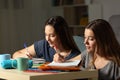 Two students doing homework together