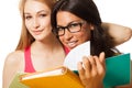 Two students with note pads Royalty Free Stock Photo