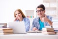 The two students preparing to school exams Royalty Free Stock Photo