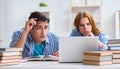 Two students preparing to school exams Royalty Free Stock Photo